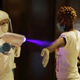 A health worker sprays sanitizer on an African migrant worker before she gets tested for Covid-19 in Beirut suburbs, Lebanon Oct. 5, 2020.